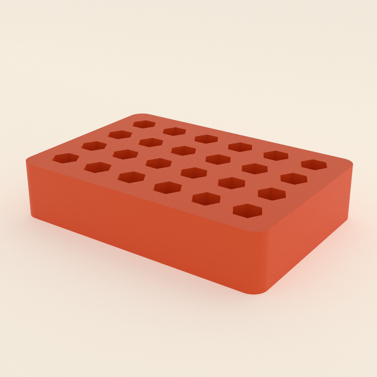 Hex Bit Organizer Block in Bright Orange PLA, 3D render on a plain background