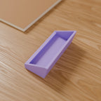 Business Card Holder in Matte Lavender PLA, on a wooden desk