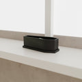 Coffin Planter with Saucer (Large 150 mm) in Matte Black PLA, on a white windowsill