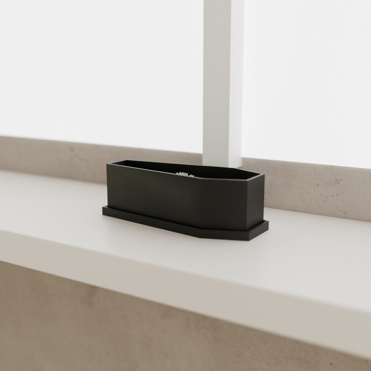 Coffin Planter with Saucer (Large 150 mm) in Matte Black PLA, on a white windowsill