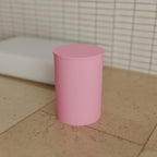 Cotton Swab Jar with Lid in Matte Pink PLA, on a bathroom counter