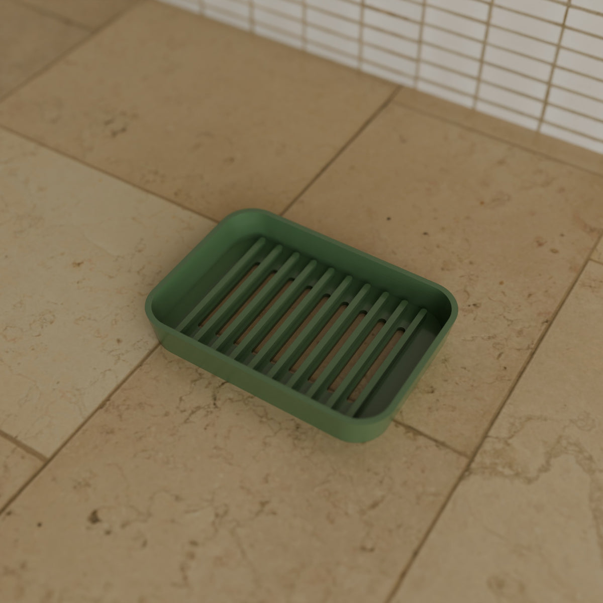Draining Soap Dish in Matte Sage Green PETG, on a bathroom counter