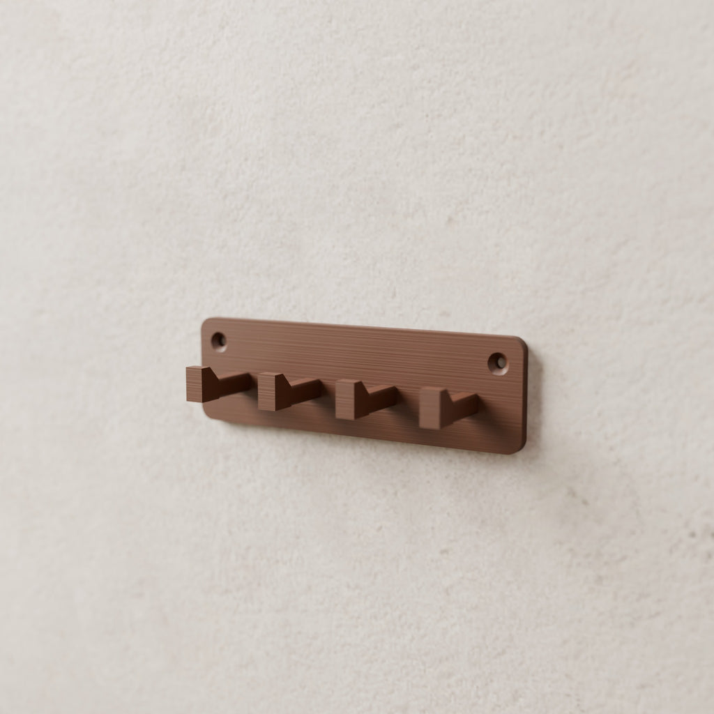 Entryway Key Rack in Matte Walnut Brown PLA, mounted on a wall