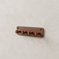 Entryway Key Rack in Matte Walnut Brown PLA, mounted on a wall