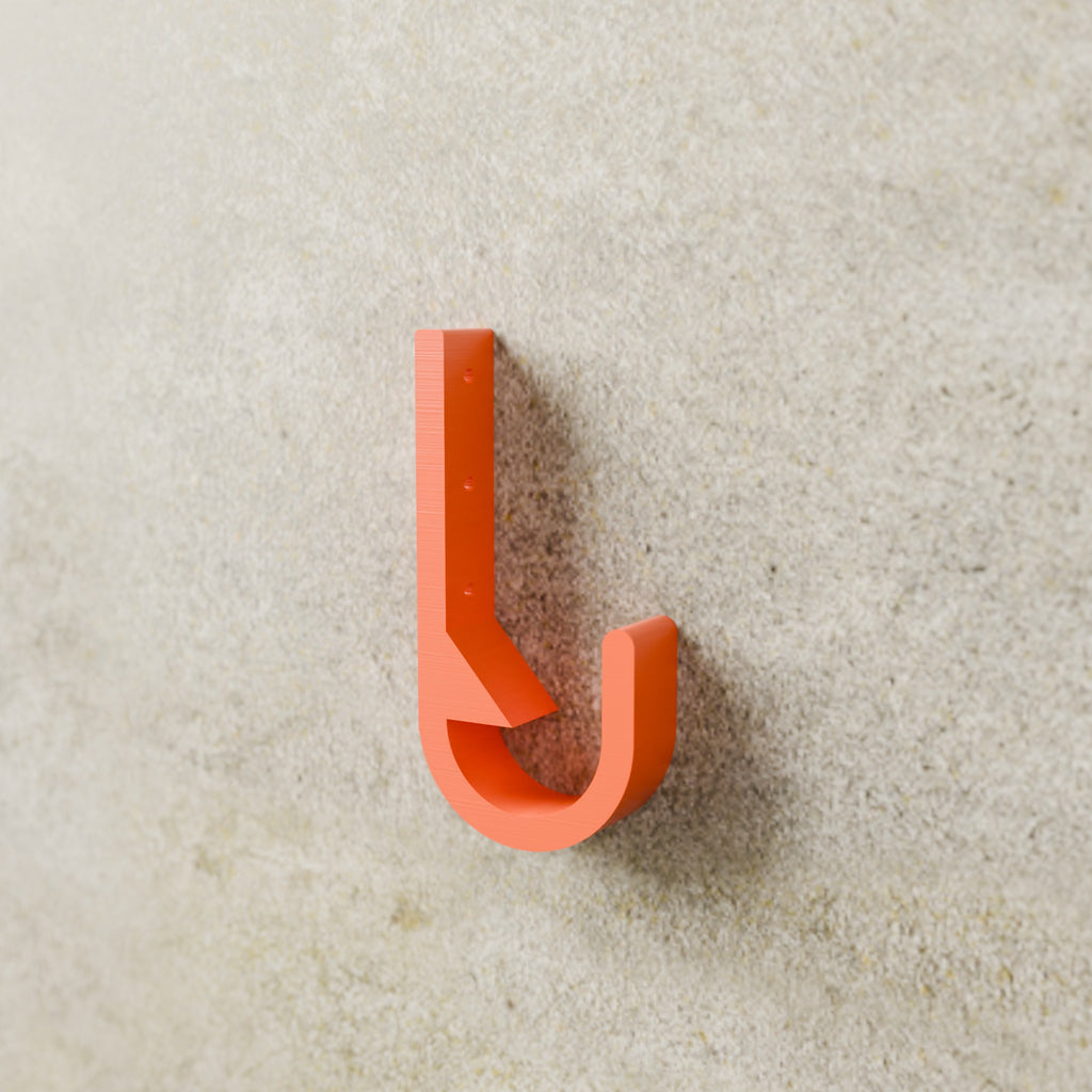 Heavy-Duty Utility Hook in Bright Orange PETG, mounted on a wall