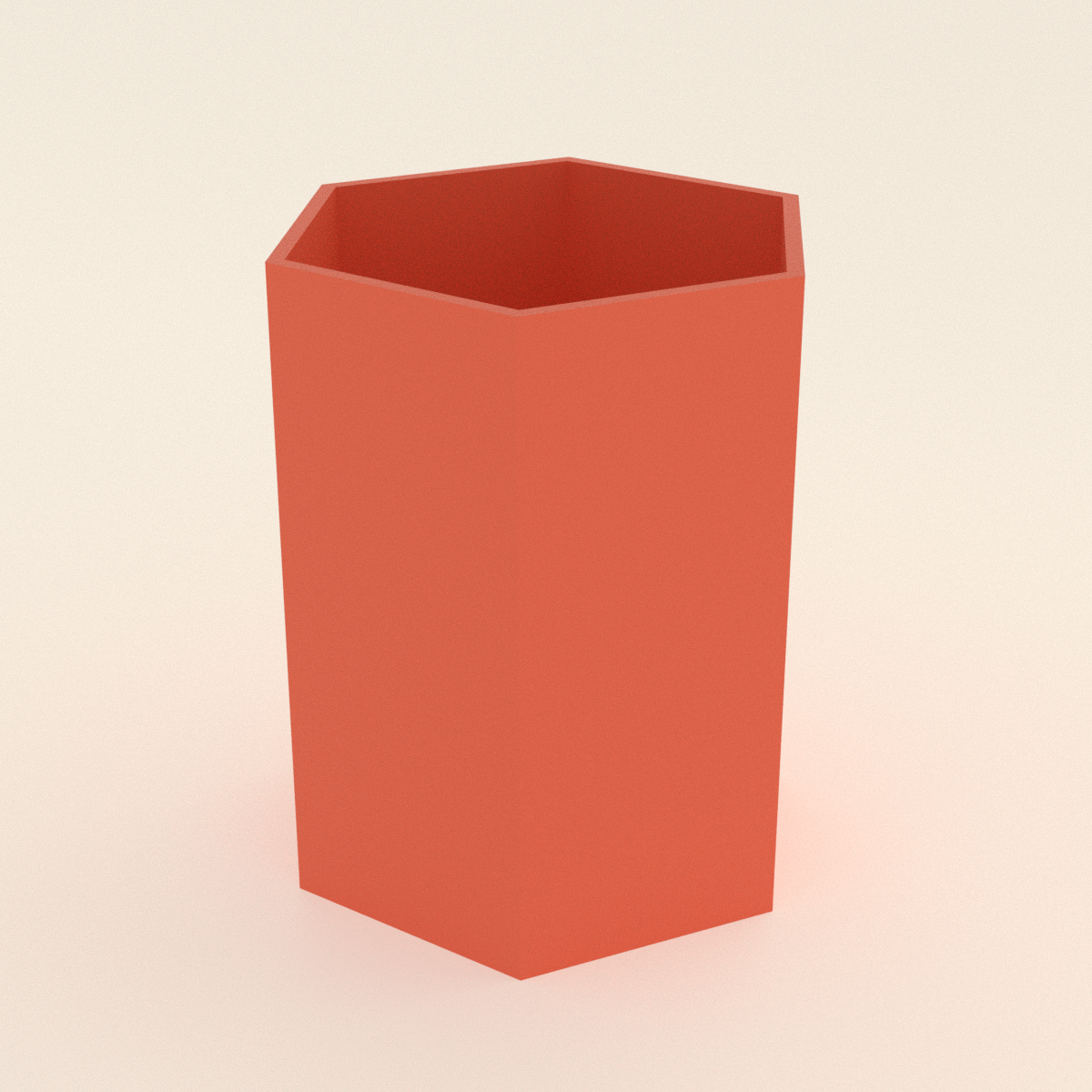 Hex Pen Cup in Matte Coral PLA, 3D render on a plain background