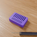 SD & microSD Card Organizer in Bright Purple PLA, on a wooden desk