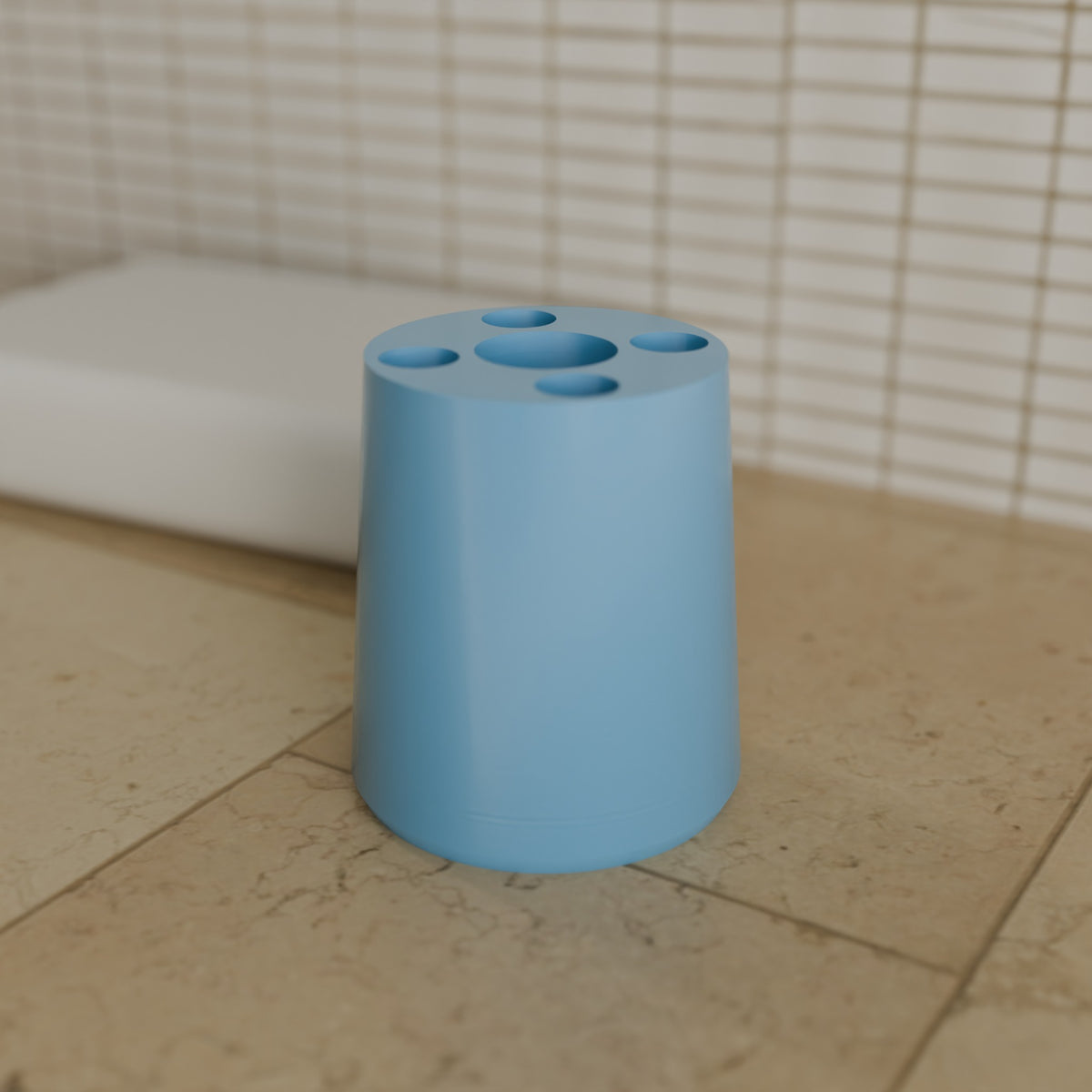 Toothbrush & Paste Holder in Matte Sky Blue PETG, on a bathroom counter