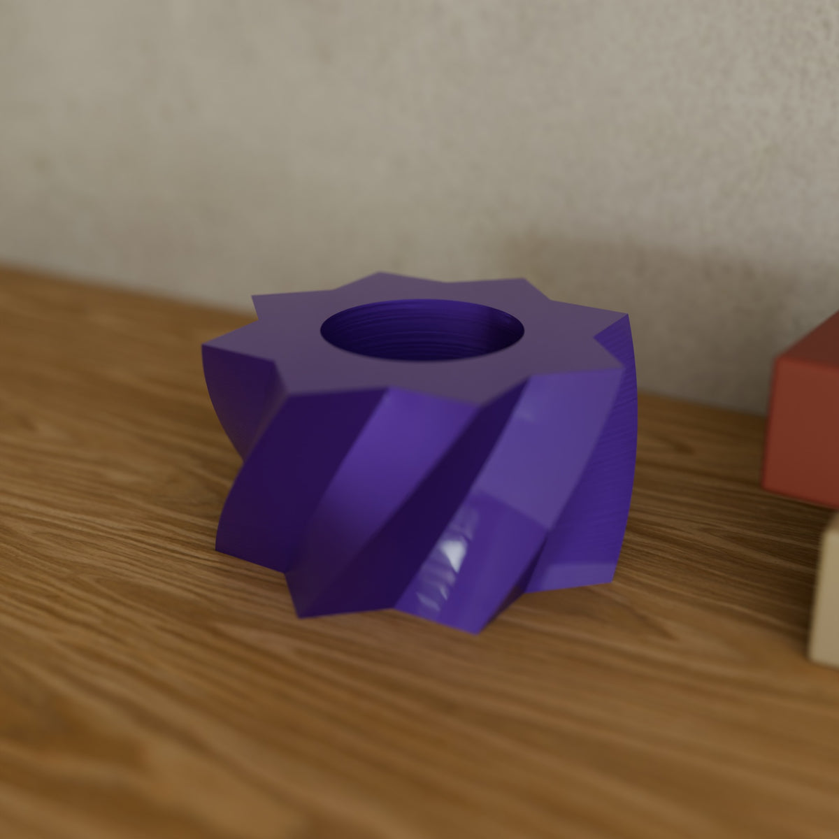 Twisted Star Tealight Holder (Medium 45 mm) in Silk Purple PETG, on a wooden shelf