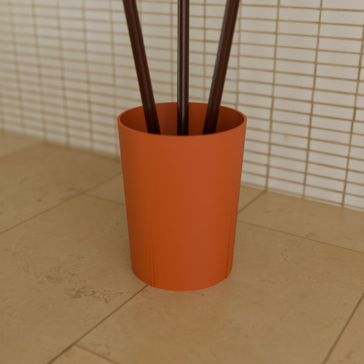 Utensil Crock in Matte Terracotta PLA, holding cooking utensils on a kitchen counter